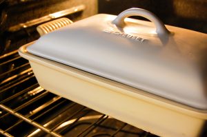 white casserole pan in oven