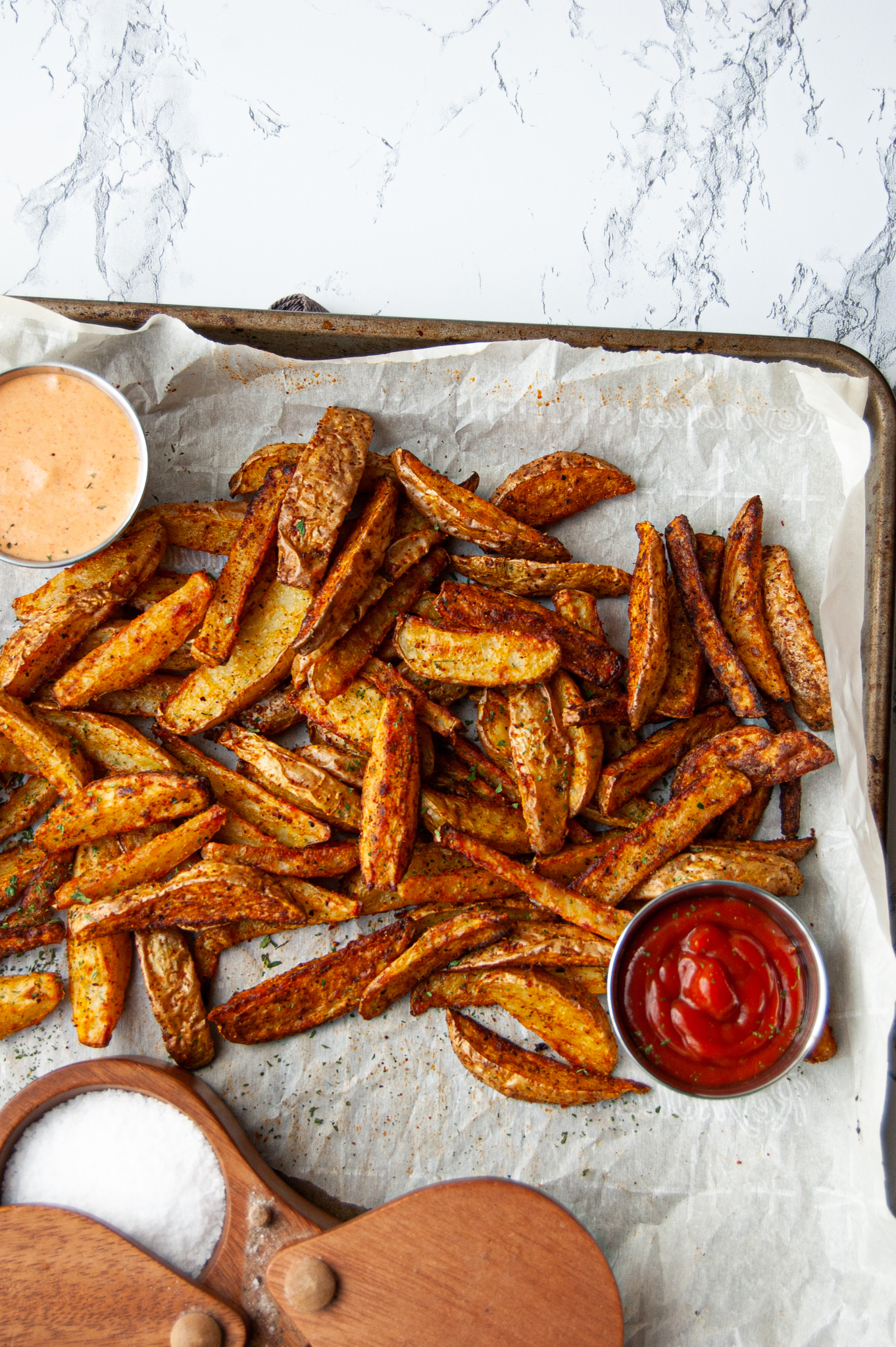 These Easy Seasoned French Fries can be made in either the oven or air fryer for a flavorful and crispy side. Perfect with your favorite dipping sauce!