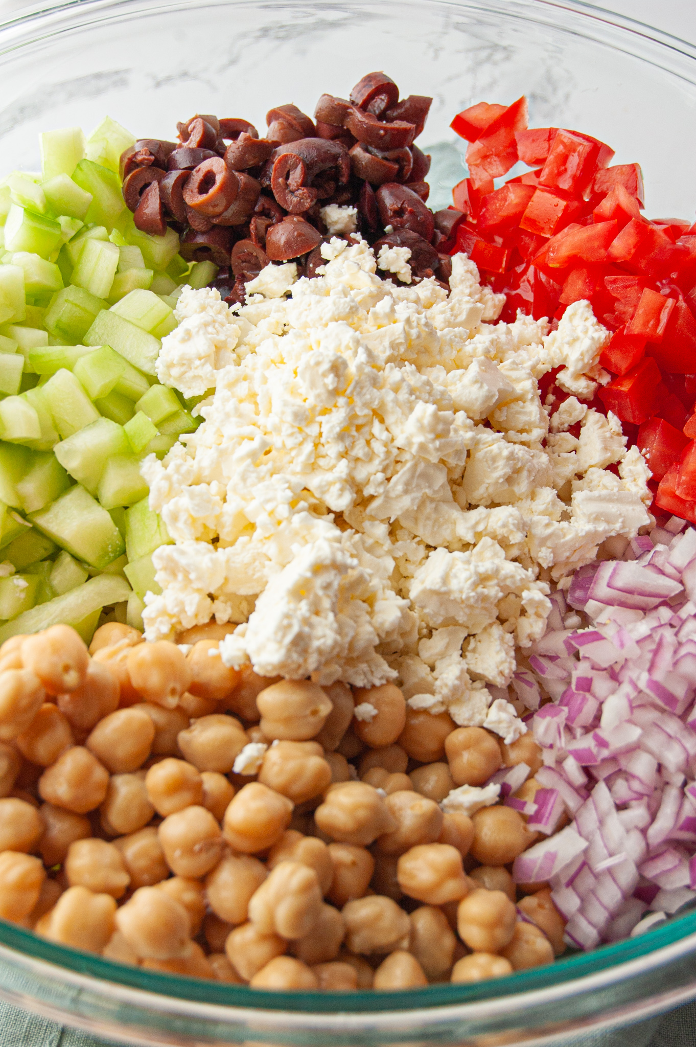 This Easy Summer Orzo Pasta Salad will soon be a family favorite! A quick 15 minutes and you have a fresh and cool side dish for any summer BBQ or get-together!